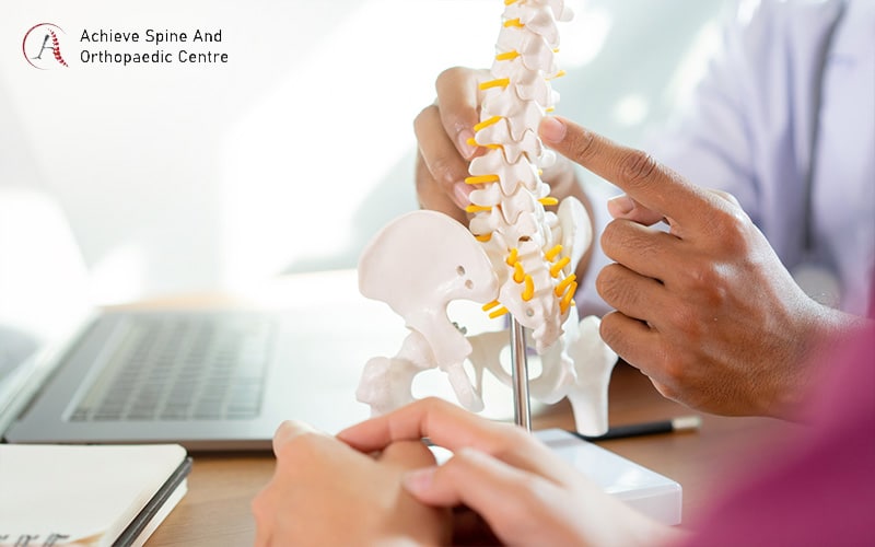 Explaining to patient about spinal conditions