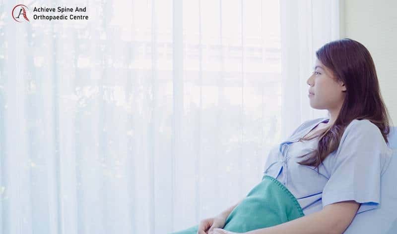 woman’s recovery journey after herniated disc surgery.